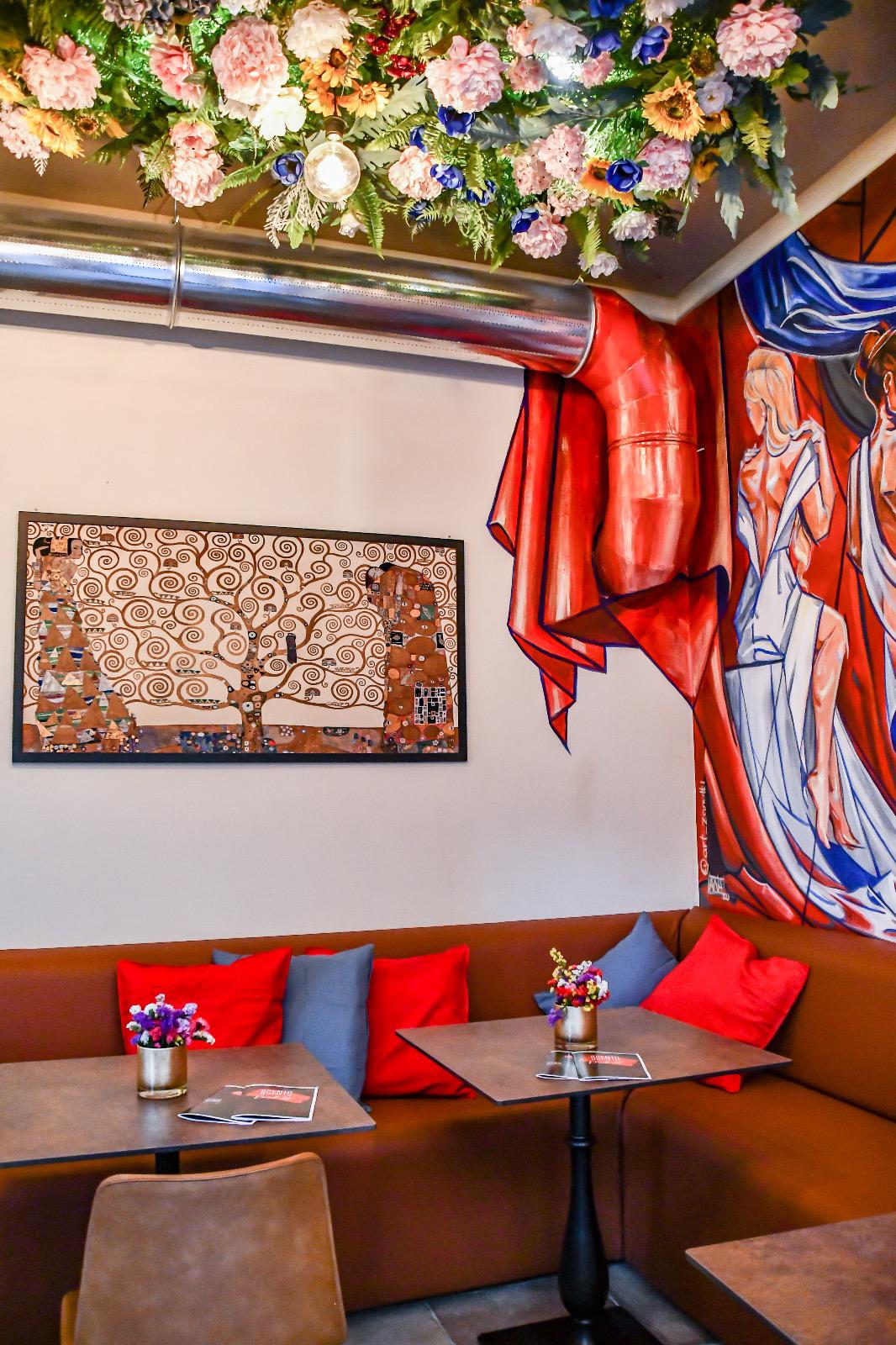 Tree of Life mural and draped red silk at SCENTO